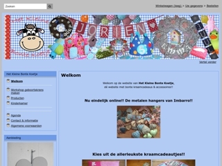 HET KLEINE BONTE KOETJE